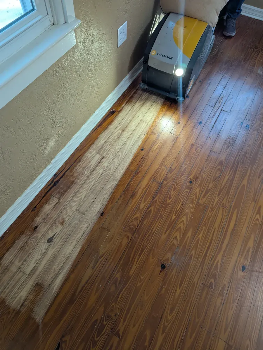 Pallmann drum sander stripping hardwood floor in Orlando — professional floor sanding by 3 Floor Guys